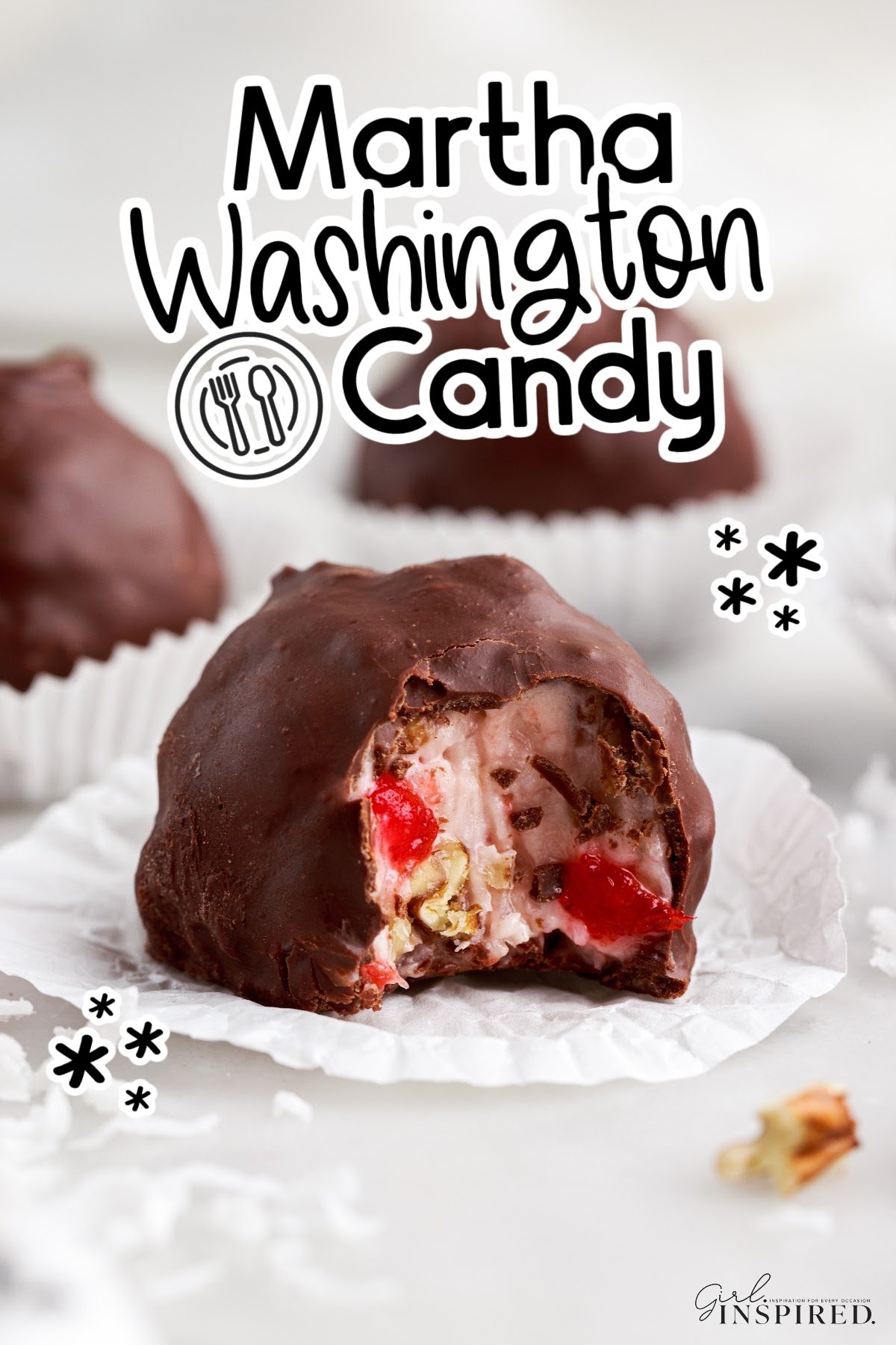 A Martha Washington candy with a bite gone, sitting on a paper wrapper.