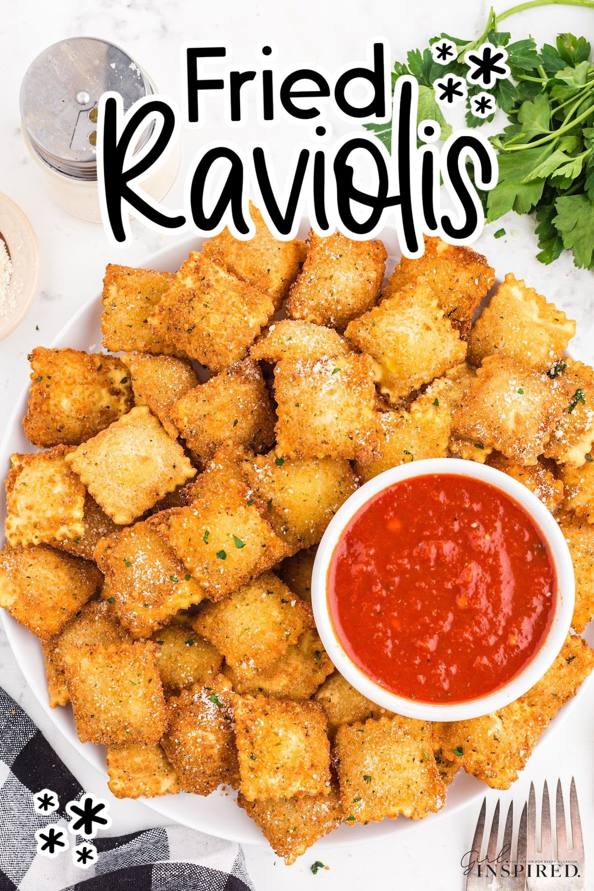 Fried Raviolis on a platter with dipping sauce, and text overlay.