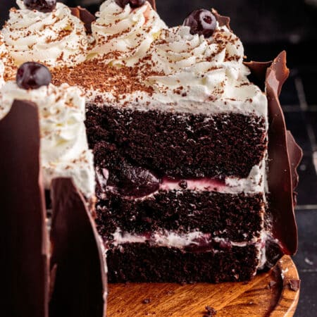 German Black Forest Cake with slices missing.