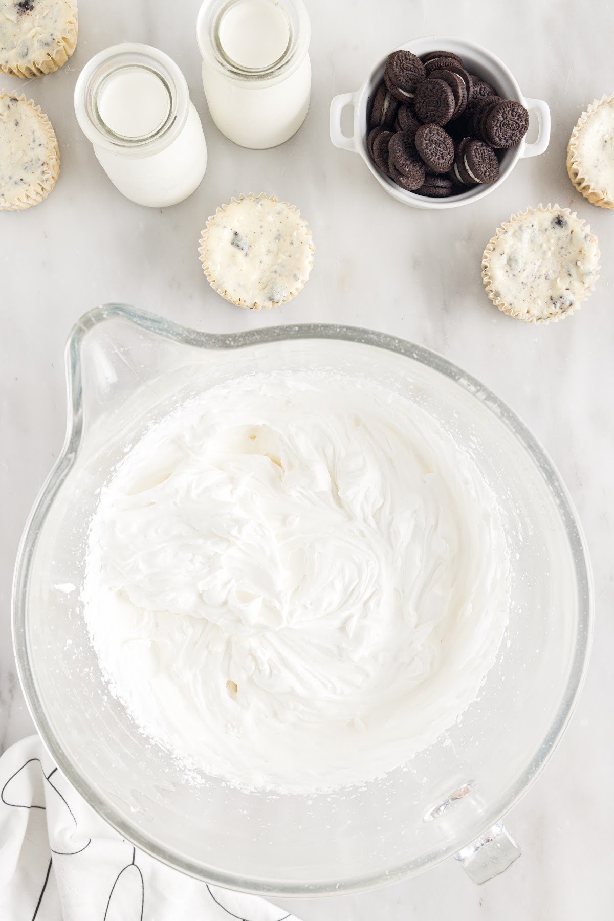 Whipped cream topping ingredients in a large bowl.