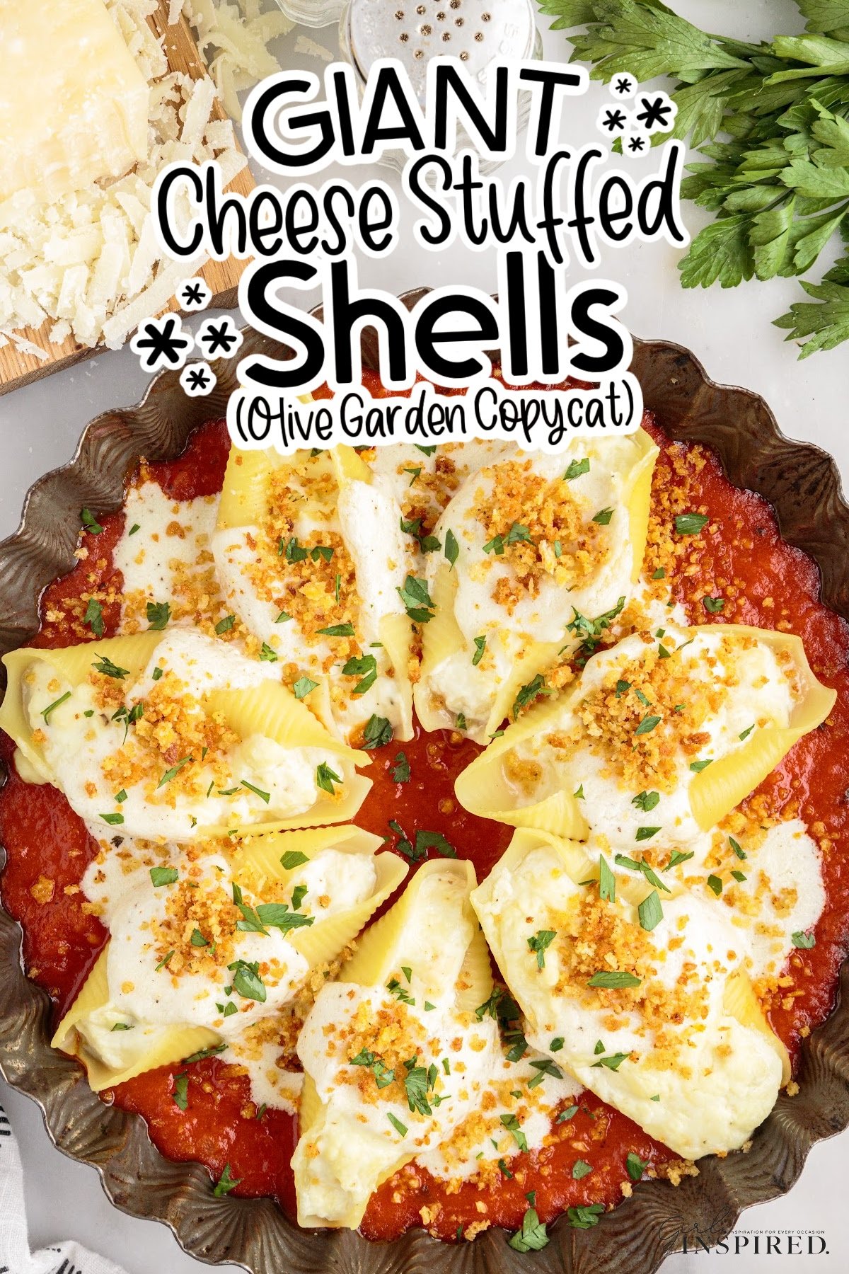 Giant Cheese Stuffed Shells olive garden copycat recipe is platted with shells in a marinara sauce, with text overlay.