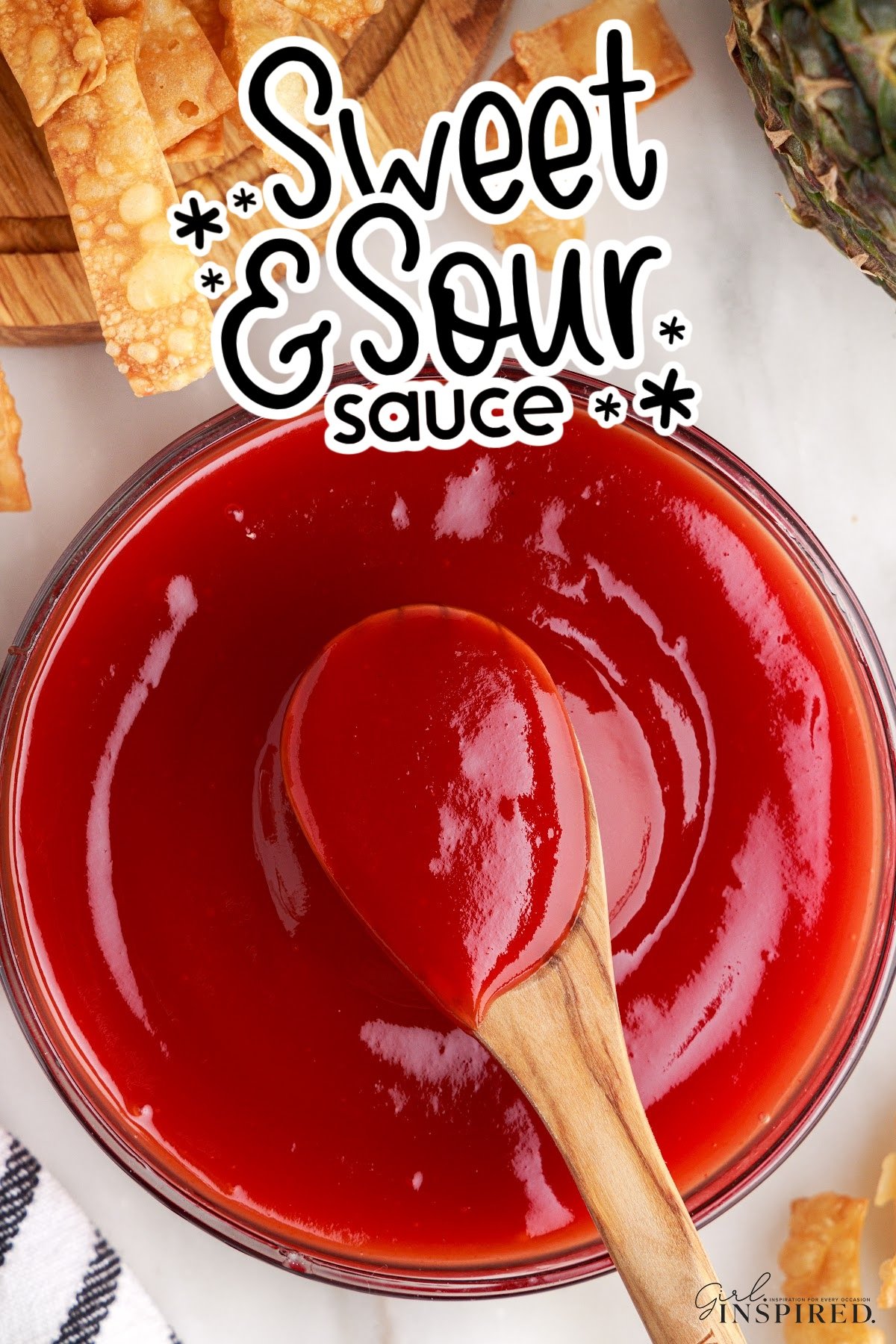 Bowl of Sweet and Sour Sauce, with a spoon scooping some out, with text overlay.