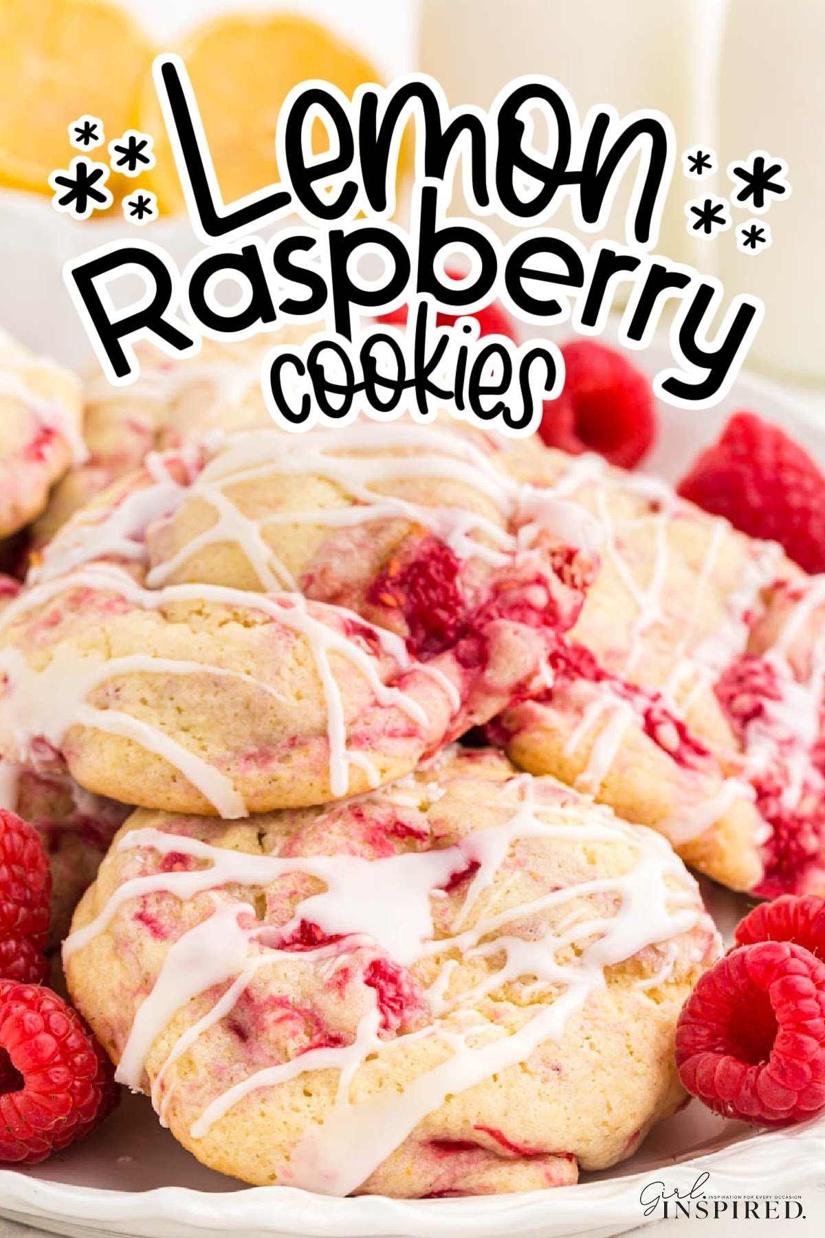 Lemon Raspberry cookies in a stack, showing the raspberry berries throughout, with text overlay.