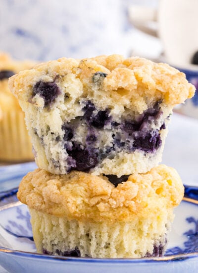 Two Sourdough blueberry muffins stacked on one another.