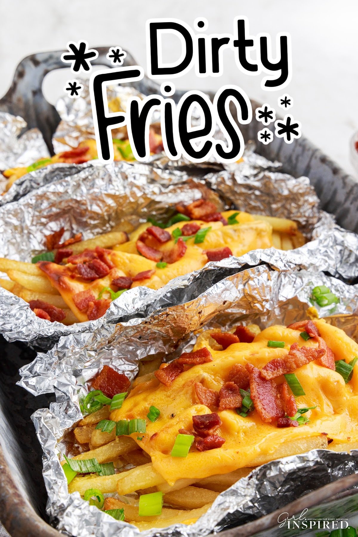 Dirty Fries in tin foil bowls fully loaded, with text overlay.