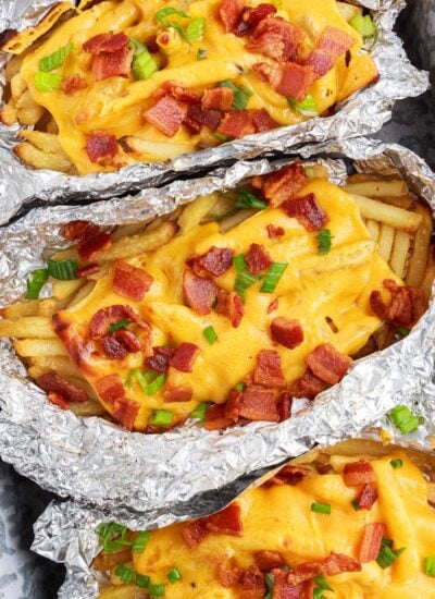 Dirty Fries in tin foil bowls fully loaded.