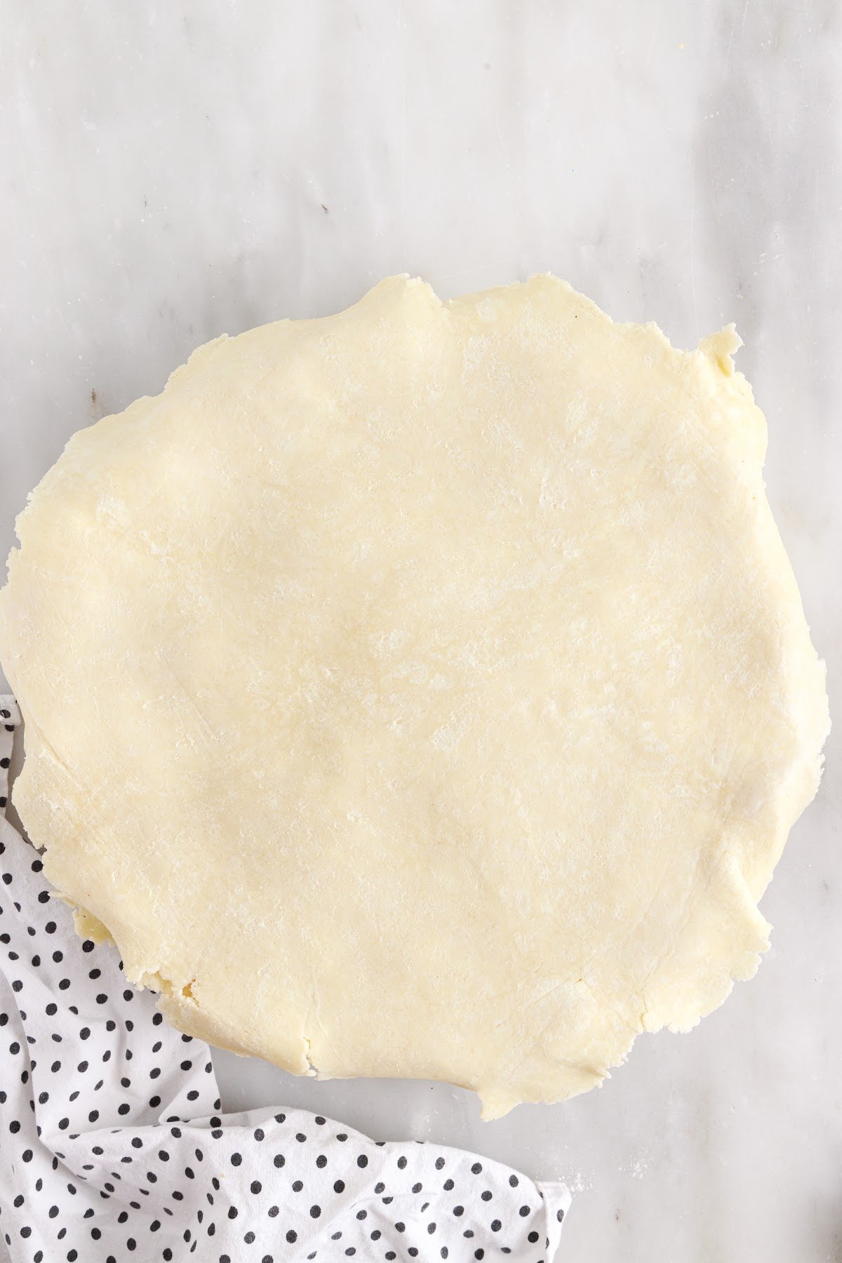 Rolled out top pie dough.
