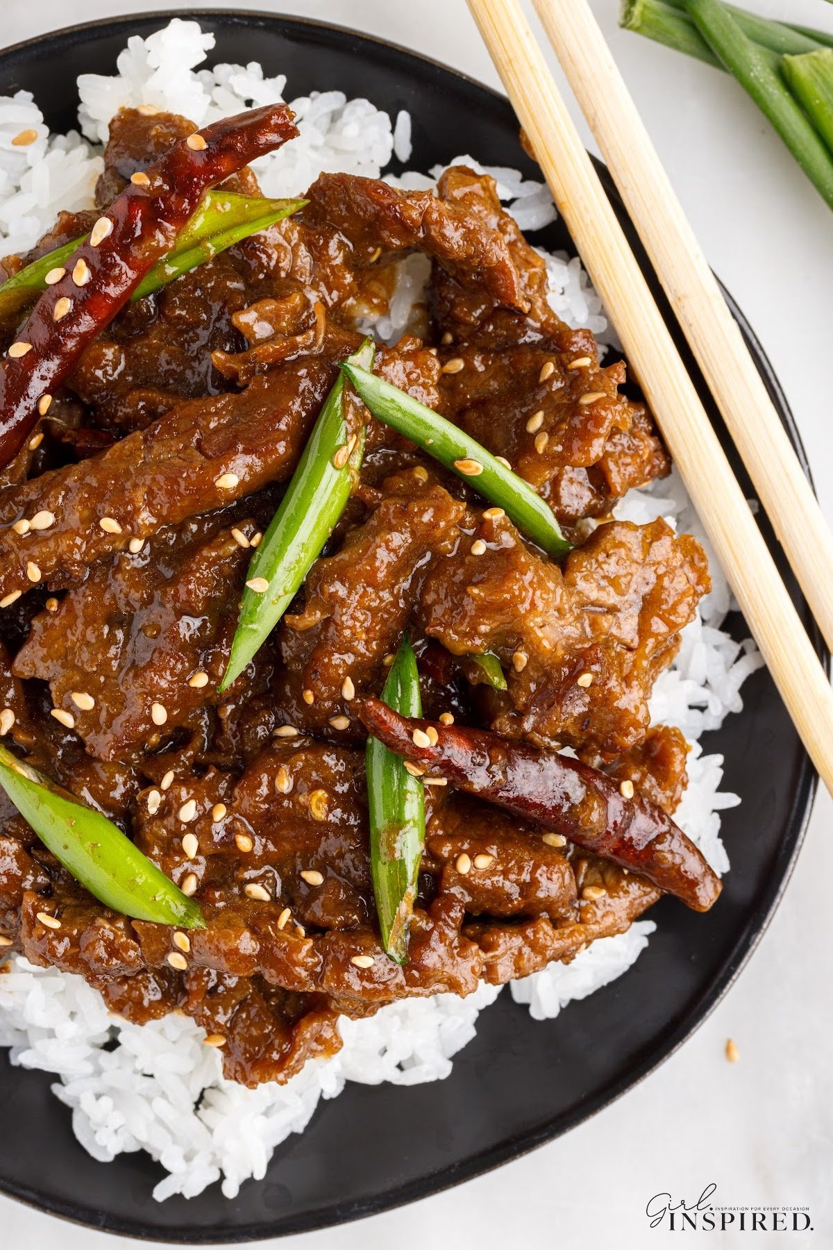 Serving platter filled with Instant Pot Mongolian Beef.