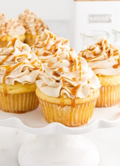 Drizzled caramel sauce on top of the Salted Caramel Cupcakes.