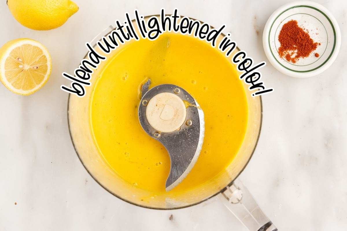 Blending the mixture until it's pale yellow.