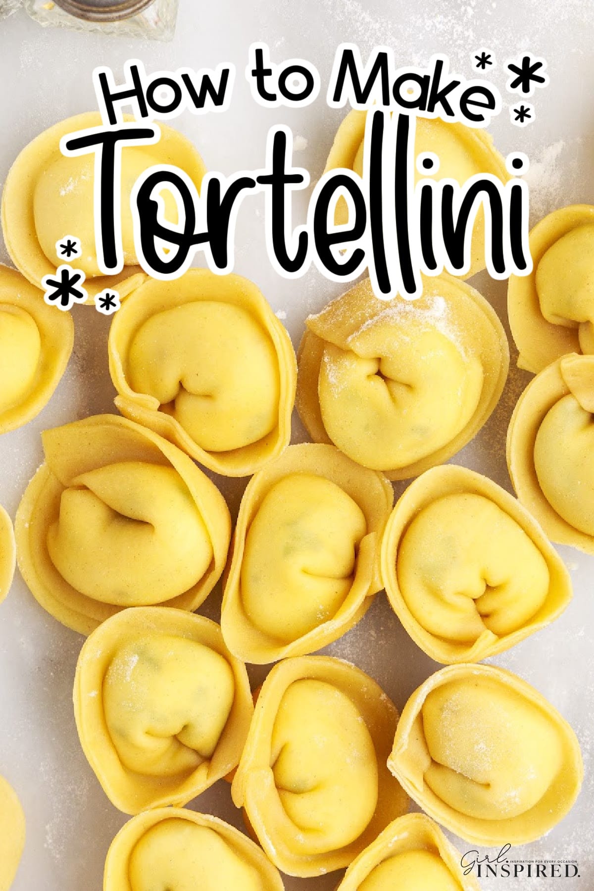 Homemade Tortellini laying on the counter, with text overlay.