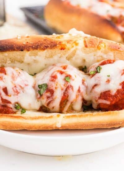 Meatball Marinara Sub openface, showing the meatballs and cheese inside.