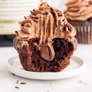 Cut in half Nutella Cupcake, showing the inside filling and frosting.