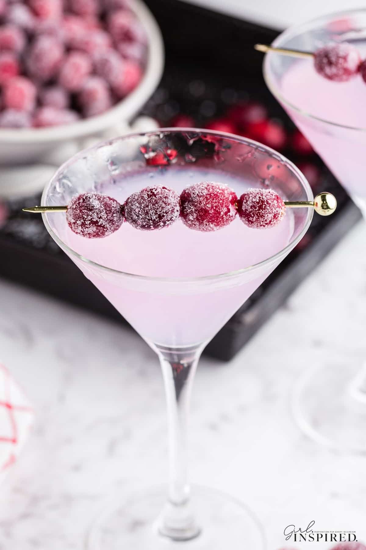 Martini Glass garnished with Sugared Cranberries.