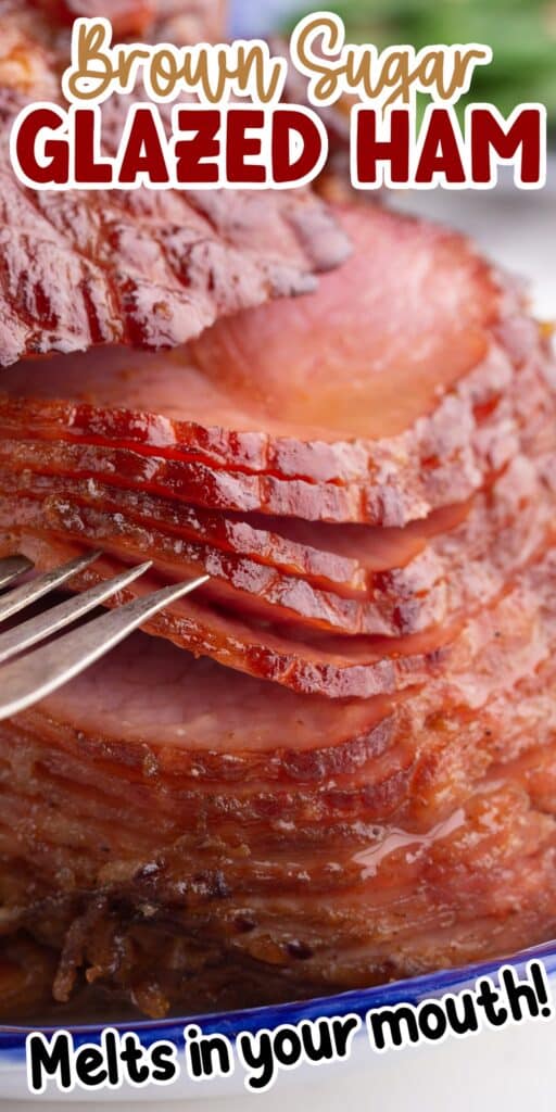 Close up of spiral cut Brown Sugar glazed ham, with a fork taking out a piece.