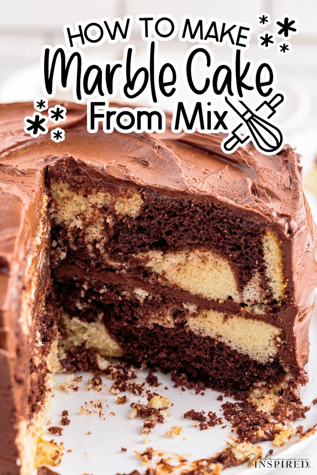 Marble Cake on a platter, with a slice out of it, showing the marbling.