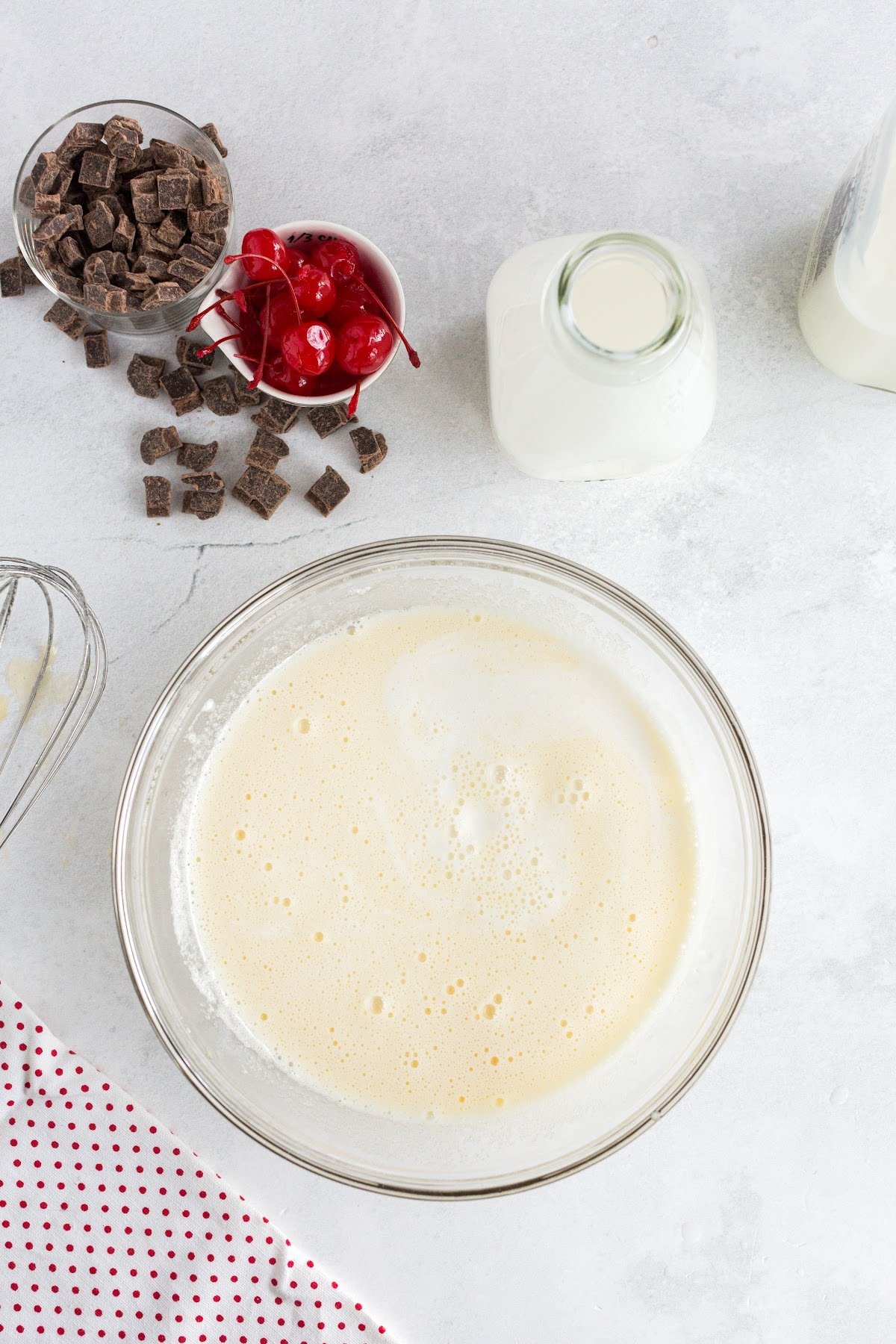 Milk and cream added to the mixture.