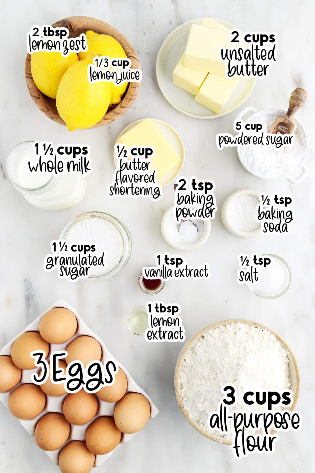 Individual ingredients laid out on the counter to make lemon layer cake, with text overlays.
