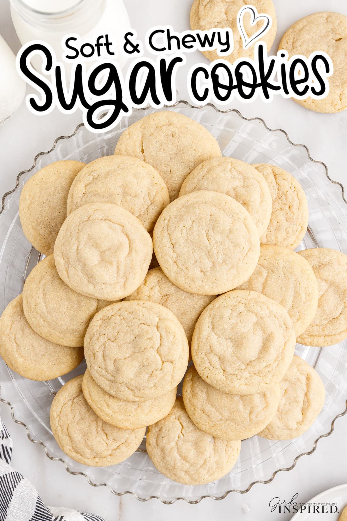 Glass platter of Soft and Chewy Sugar cookies, with text overlay.