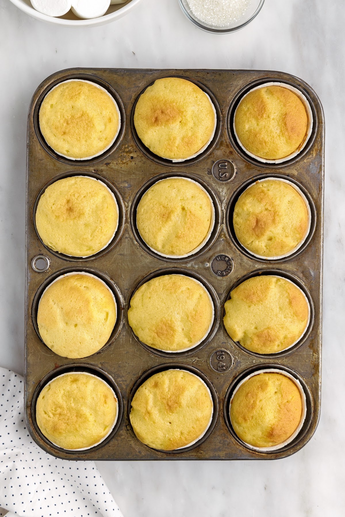 cooling cupcakes on a wire rack until completely cooled.