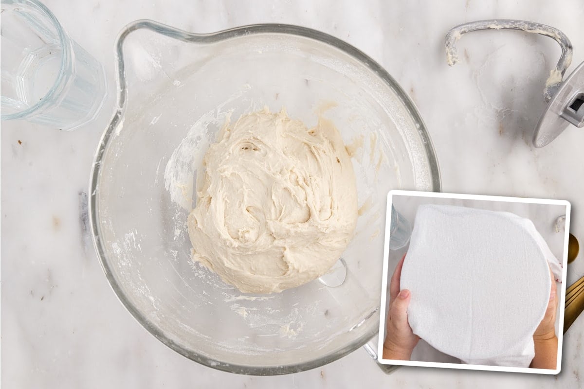 Forming the dough into a ball and it is sitting in the bowl with the dough hook off to the side.