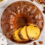 Top view of a Bacardi Rum Cake with slices and text overlay.