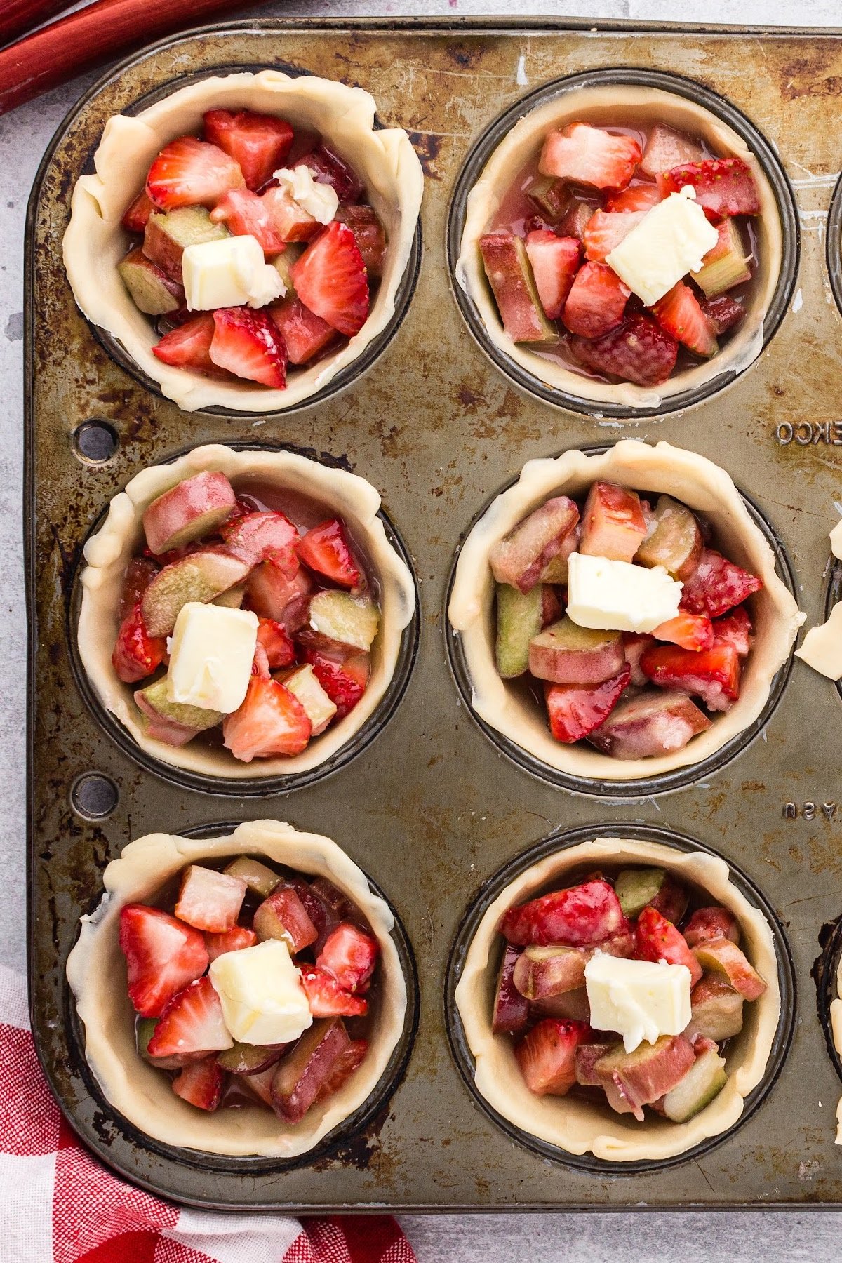 Added a pad of butter to the unbaked mini pies.