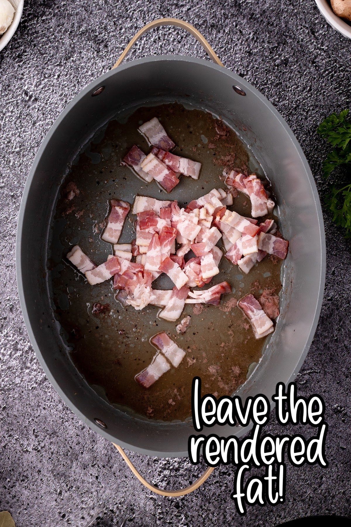 Bacon pieces in a stockpot.