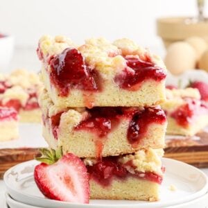 Side view of a stack of Strawberry Bars, showing the gooey strawberry mixture!