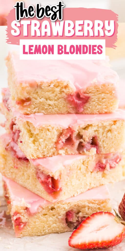 all stack of Strawberry Lemon Blondies on a plate showing the berries and brownie inside with pink frosting.