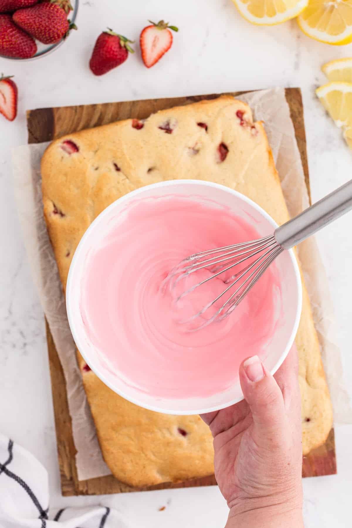 Mixed the glaze ingredients in a bowl until smooth, sitting above the baked blondies.