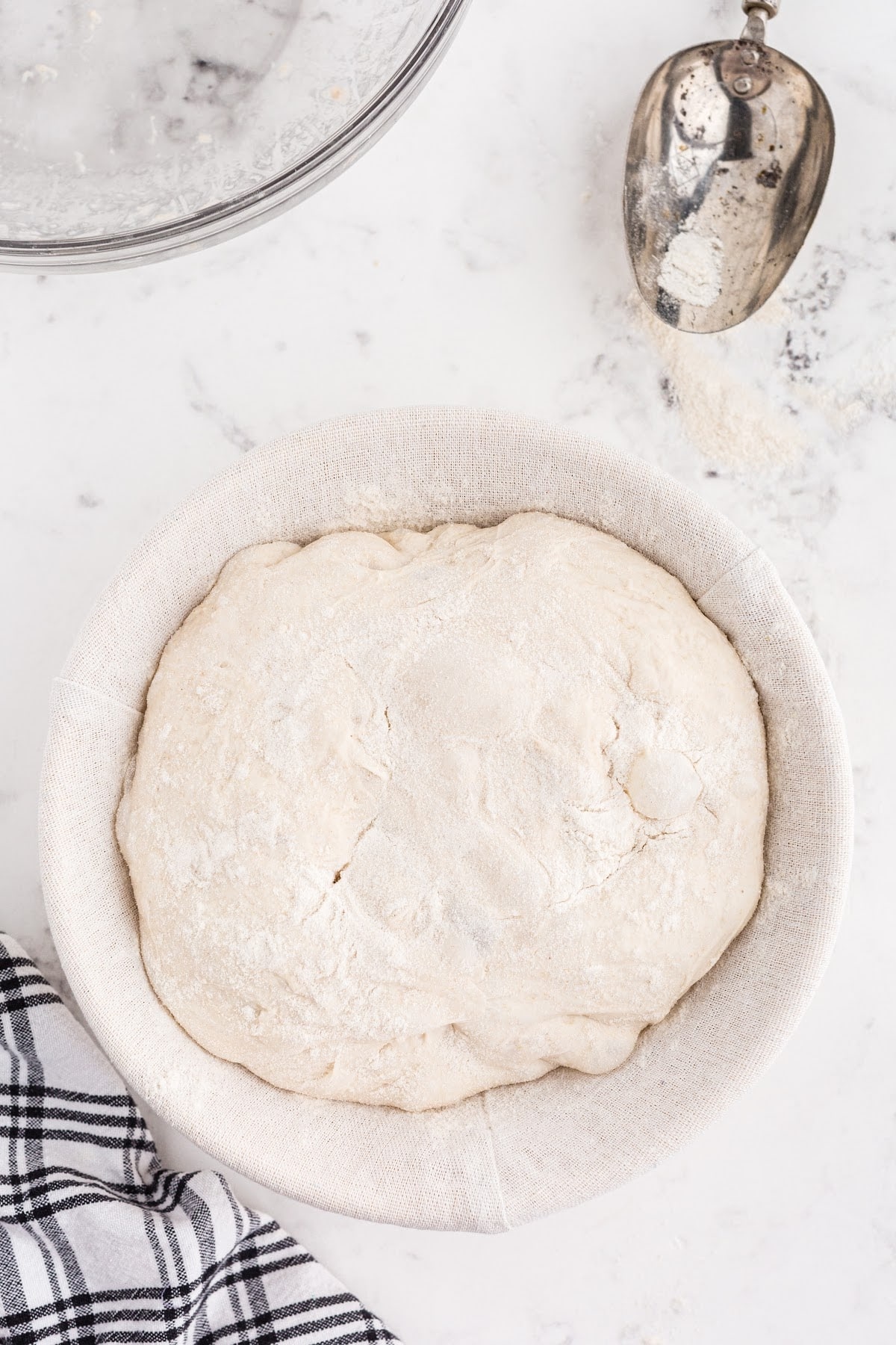 Sourdough bread dough in banneton basket.