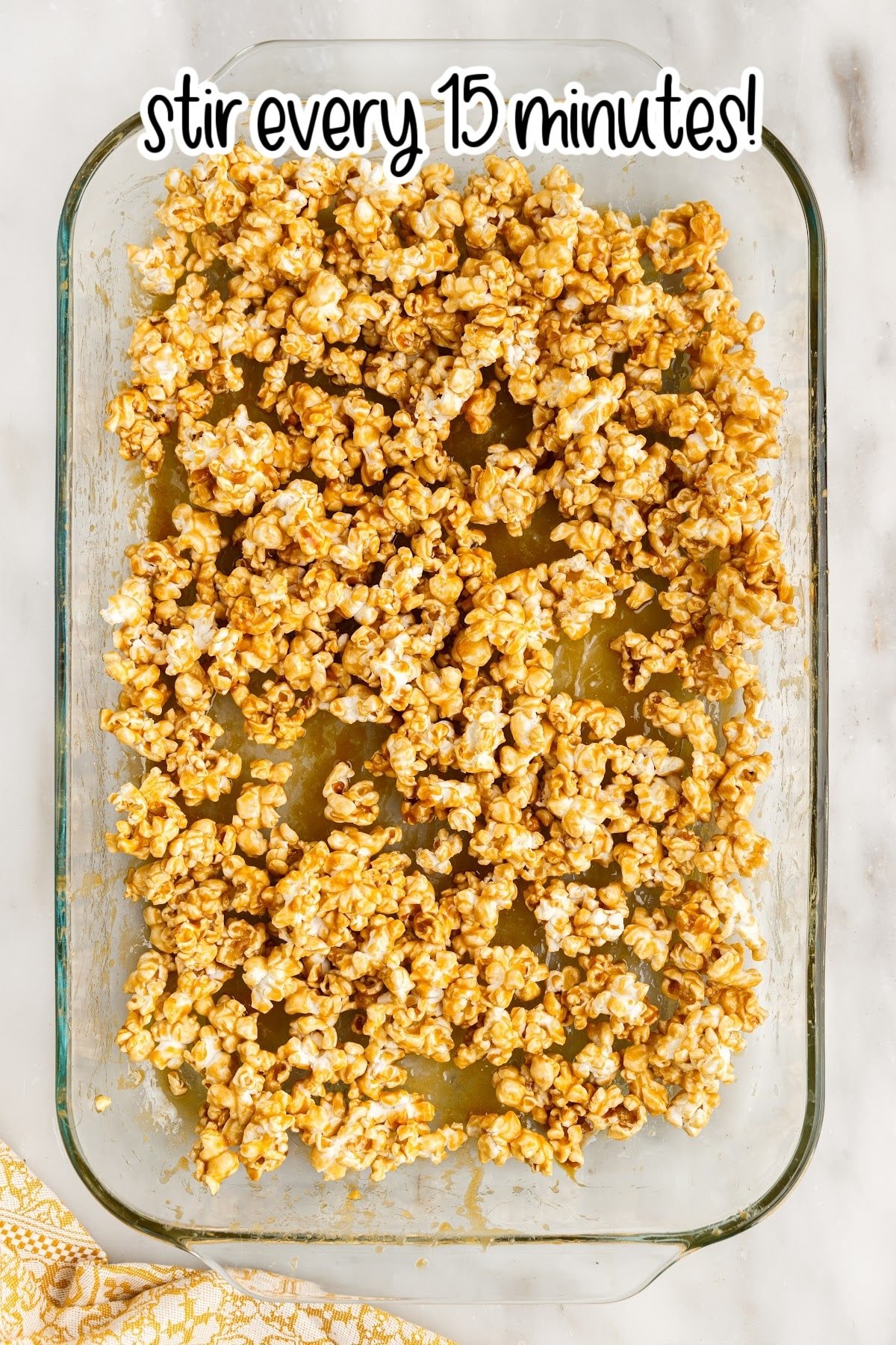 Caramel corn in glass casserole dish.