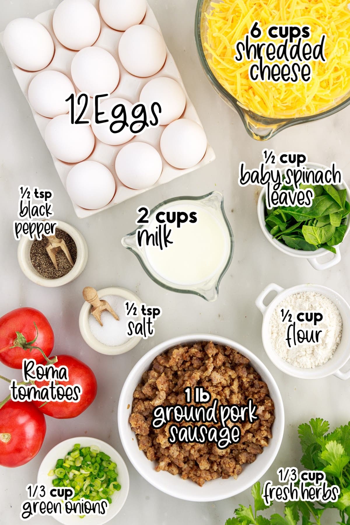 Cheesy egg bake ingredients on a marble countertop.