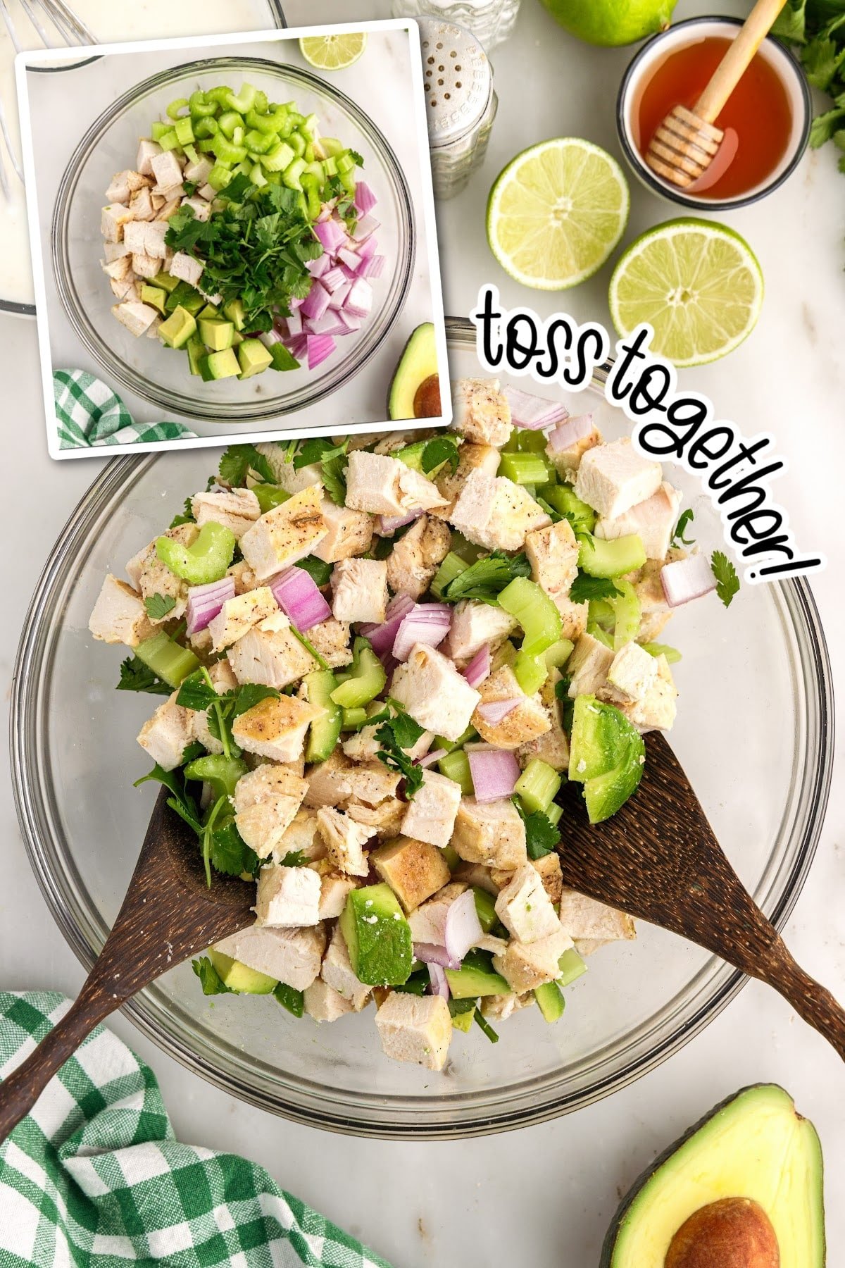 A larger glass mixing bowl with fresh chicken salad ingredients tossed together. Another image in the corner of the fresh salad ingredients prior to being tossed. 