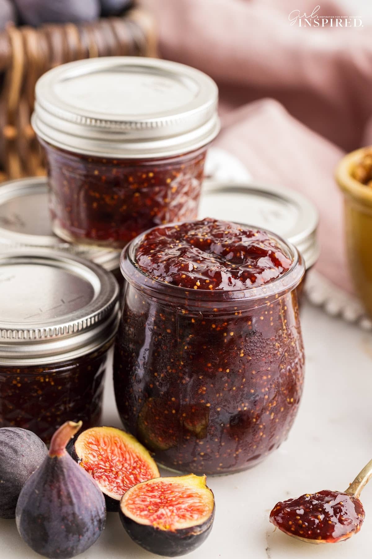 Balsamic fig jam transferred into glass mason jars.